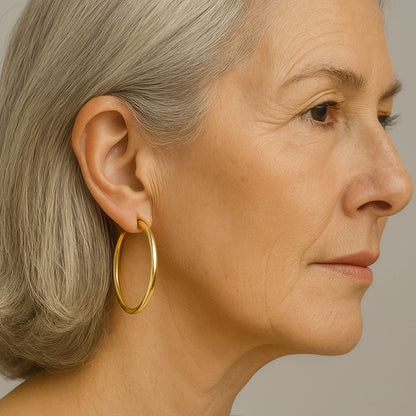 Large hoop earrings in gold